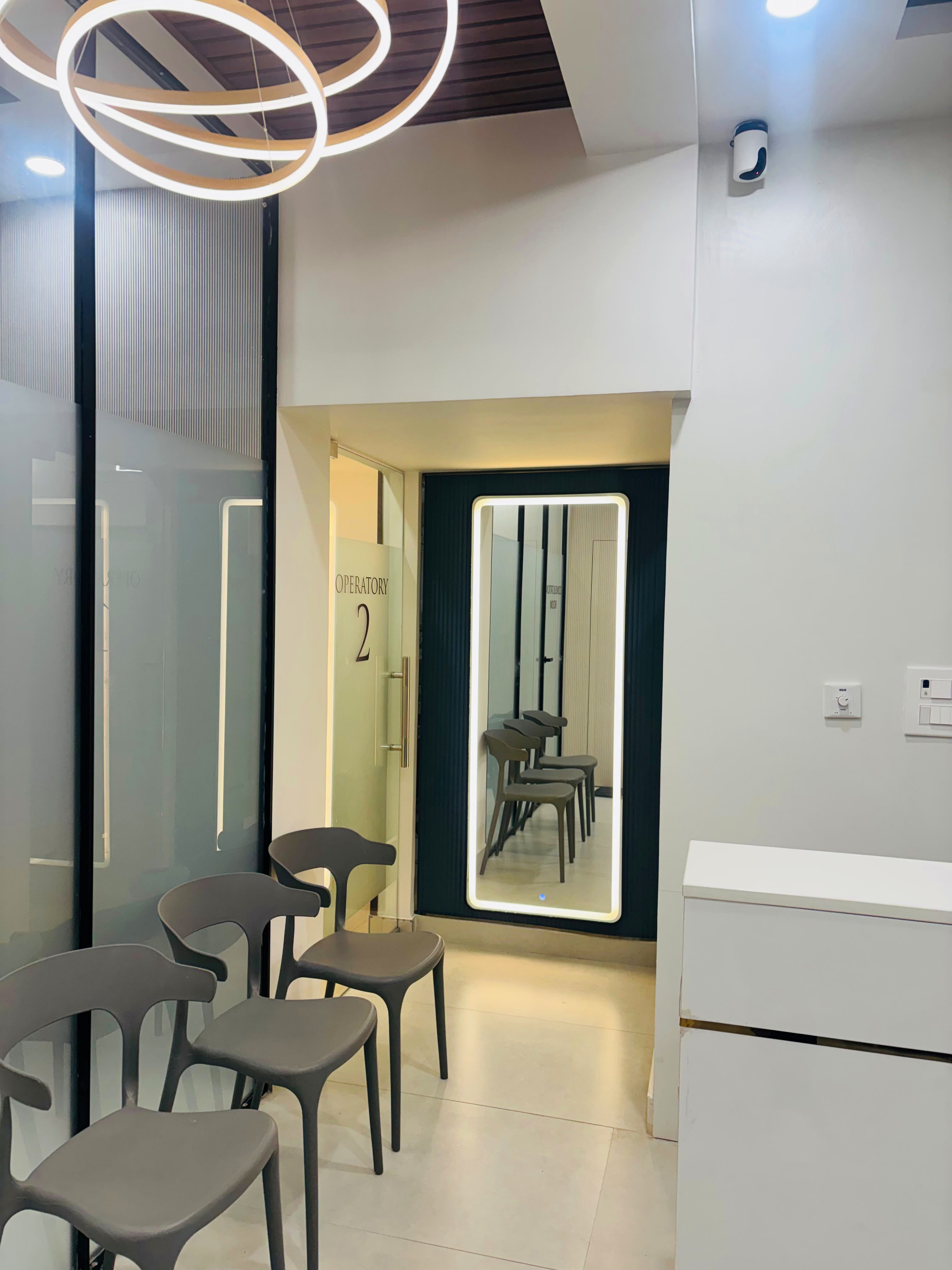 Elora Dental comfortable patient waiting lounge in Velachery