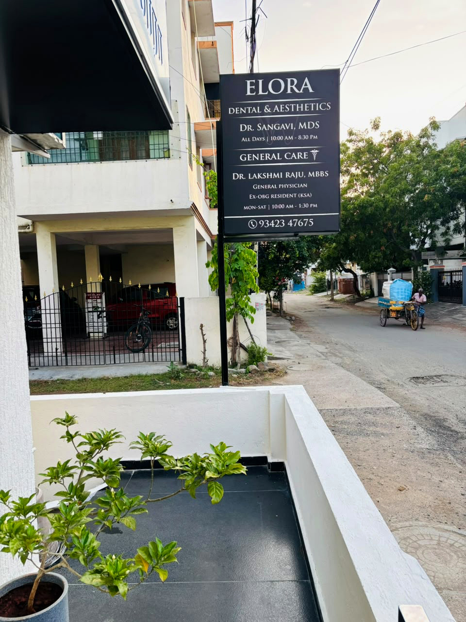 Elora Dental & Aesthetics illuminated clinic signboard at VGP Selva Nagar, Velachery