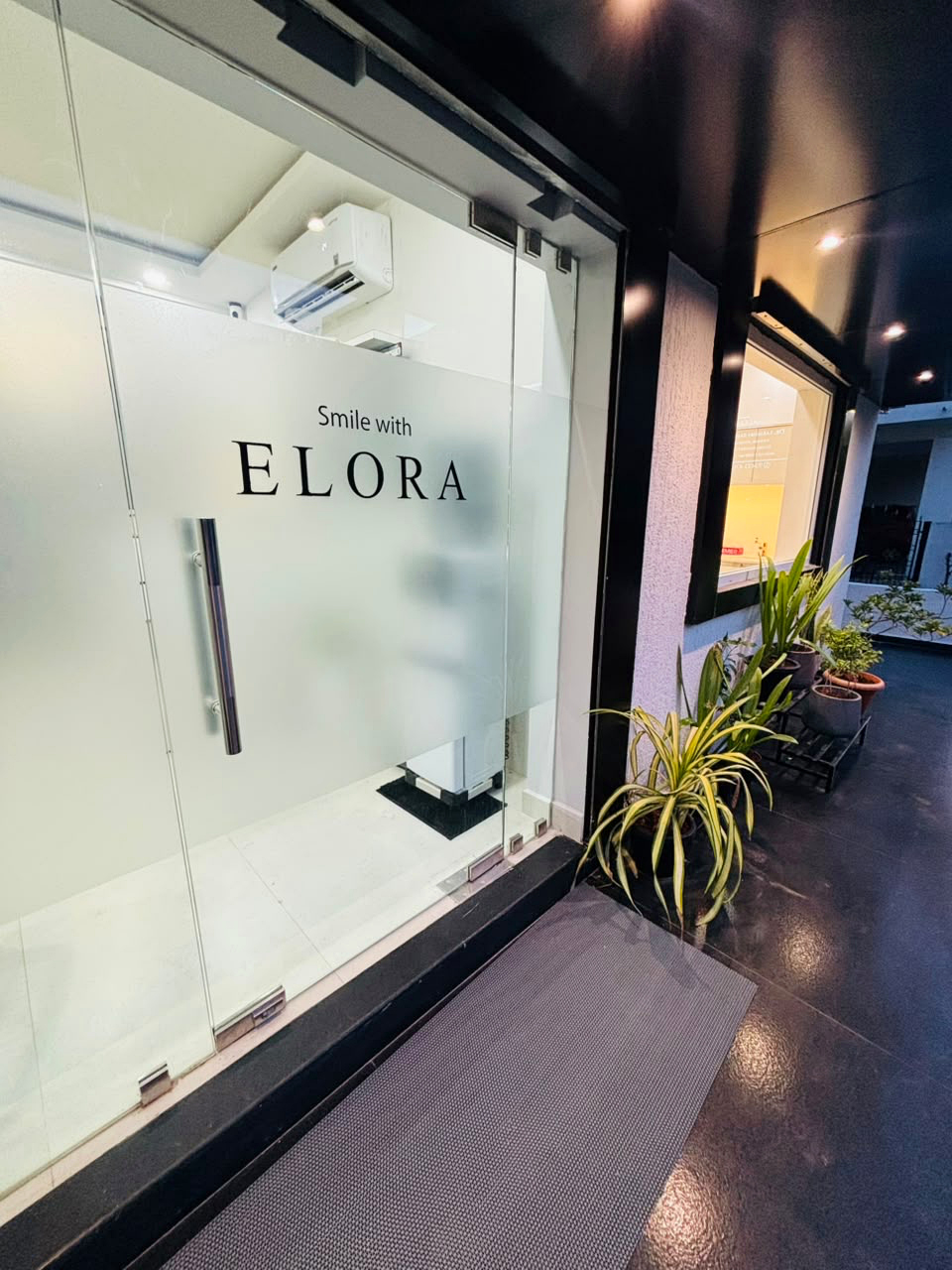 Elora Dental clinic glass entrance door in Velachery, Chennai